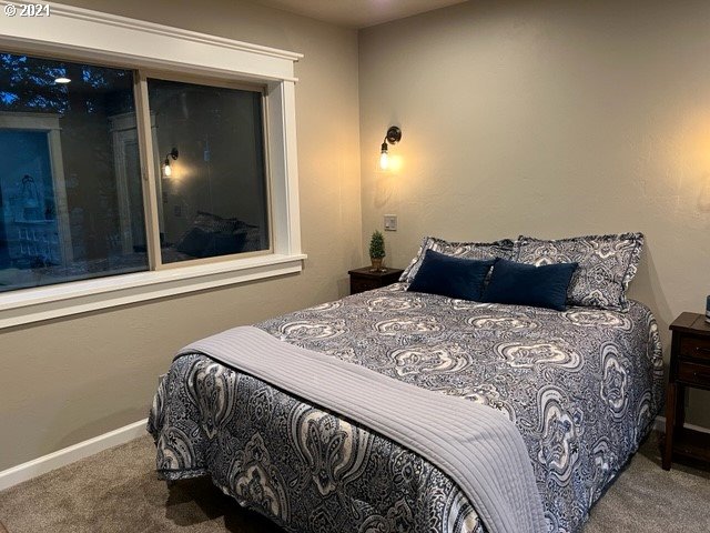 83490 Rattlesnake Road Dexter, OR 97431 - Photo 17 of 27 a bedroom with a bed and a window