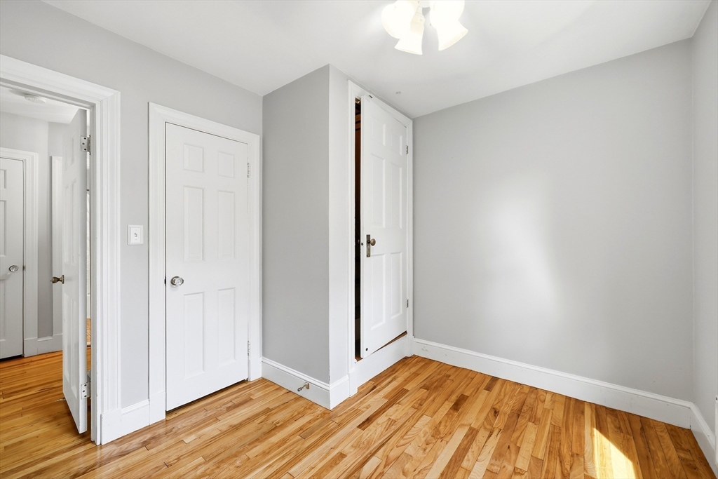 32 Lincoln Road Longmeadow, MA 01106 - Photo 27 of 36 a view of a room with wooden floor and a window