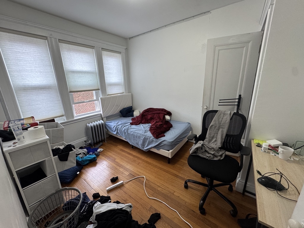 10 Alton Court, Unit 2 Brookline, MA 02446 - Photo 14 of 17 a room with furniture and a window