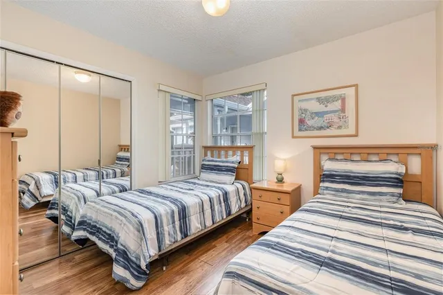 a bathroom with a sink toilet and a mirror