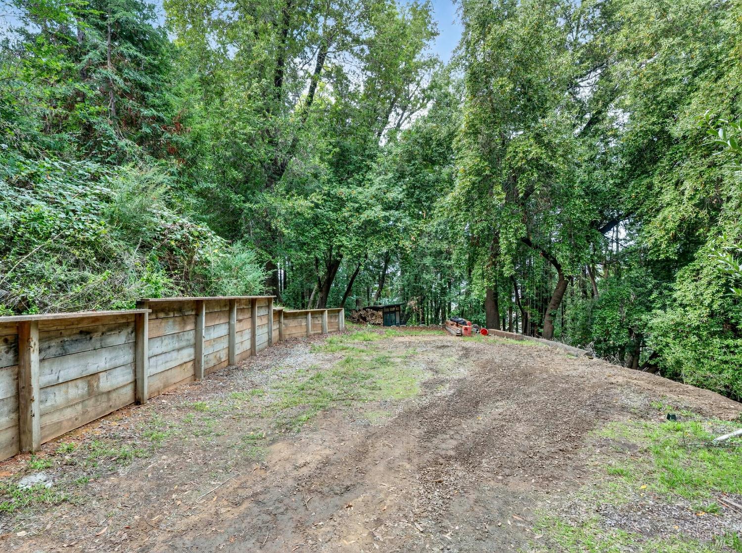 31 Red Rock Way San Rafael, CA 94903 - Photo 8 of 16 a backyard of a house with lots of green space