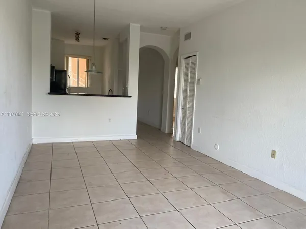 a view of a hallway with entryway