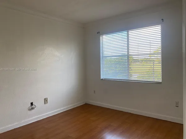 an empty room with a window