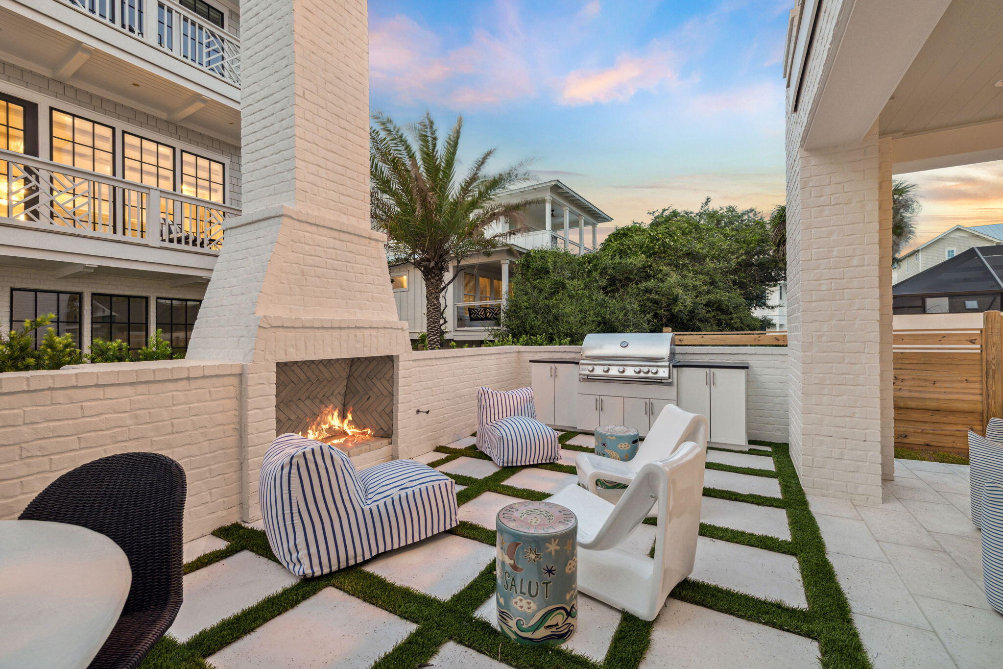 80 Green St Inlet Beach Inlet Beach, FL 32461 - Photo 3 of 111 a view of a patio with couches table and chairs and potted plants