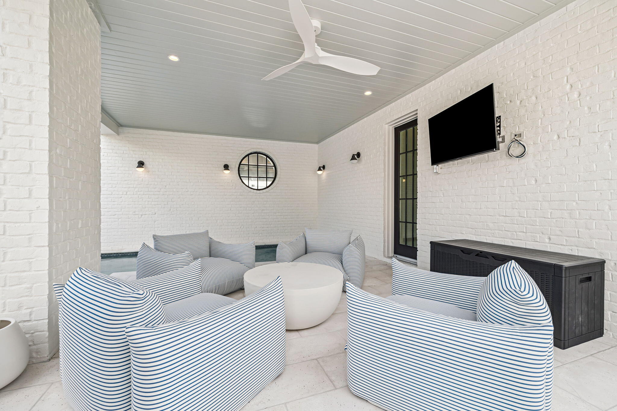 80 Green St Inlet Beach Inlet Beach, FL 32461 - Photo 88 of 111 a living room with furniture and a flat screen tv