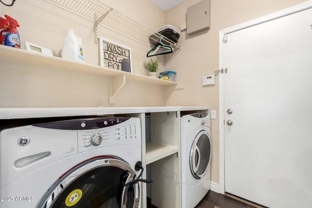 a utility room with dryer and washer