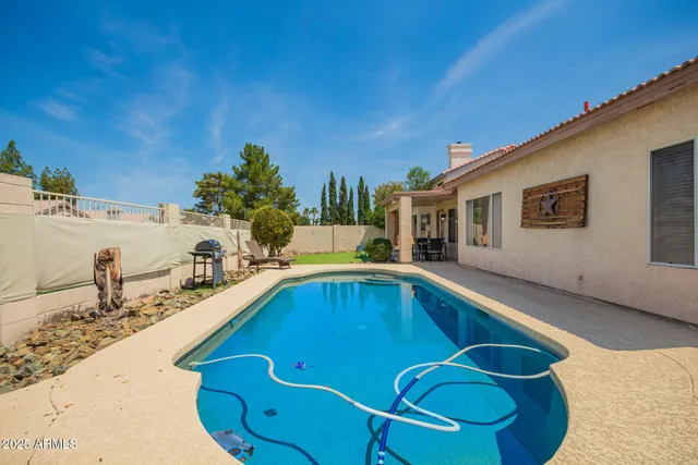 a view of outdoor space yard swimming pool and furniture
