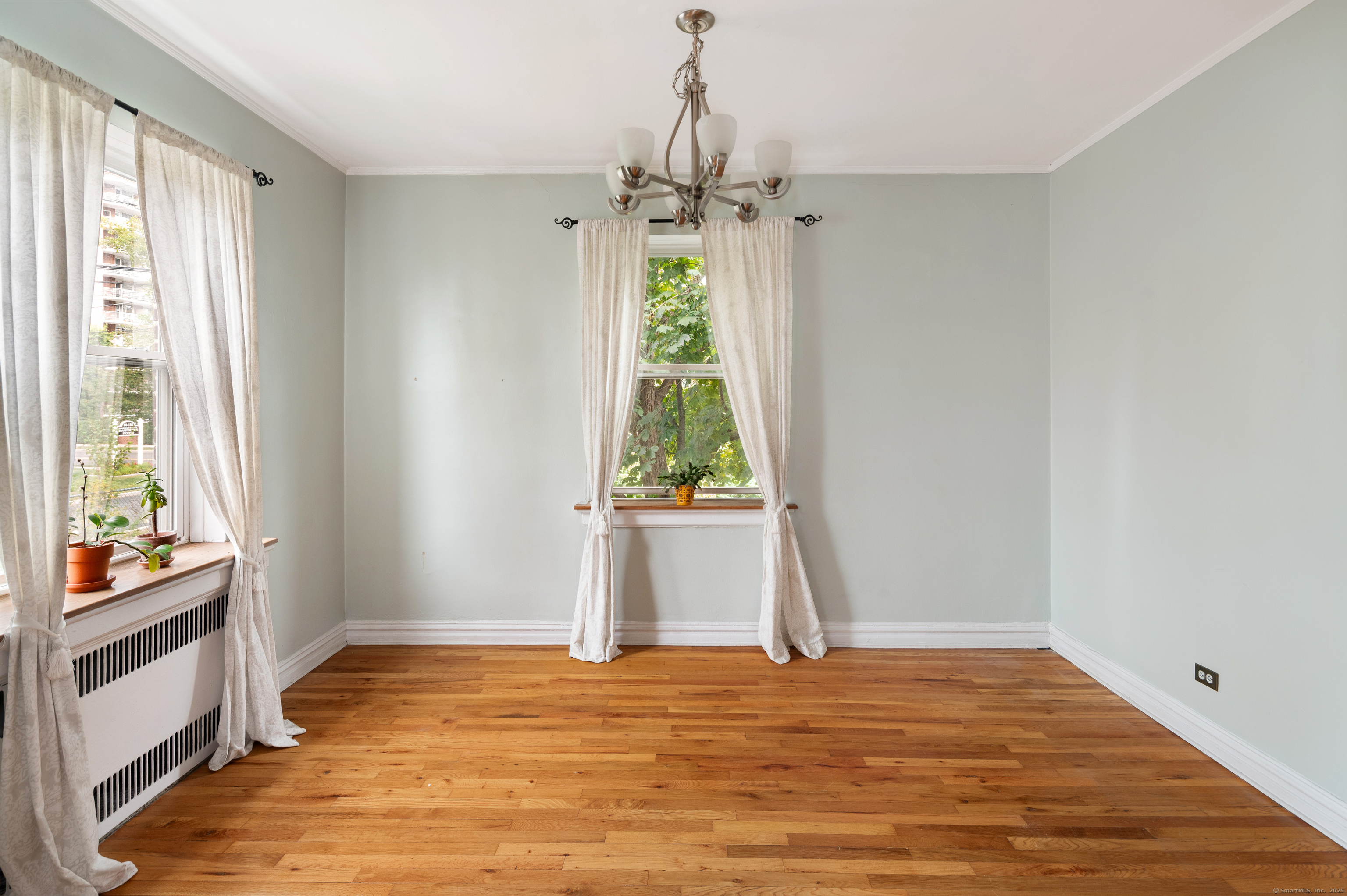 70 Strawberry Hill Avenue, Unit 22D Stamford, CT 06902 - Photo 12 of 39 a view of an empty room and window