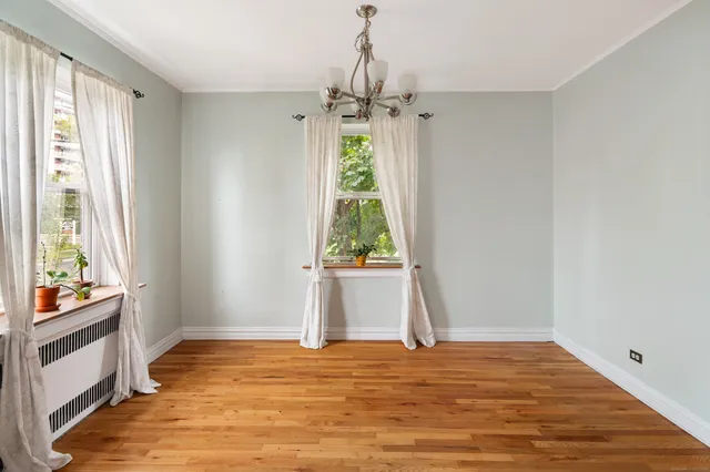 a view of an empty room and window