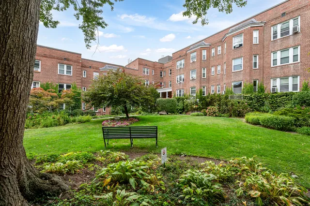 a garden view with a seating space