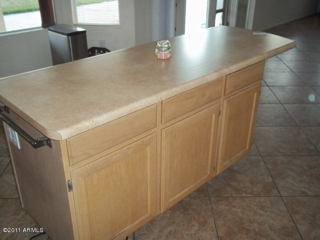 7817 West Boca Raton Road Peoria, AZ 85381 - Photo 8 of 12 KITCHEN ISLAND