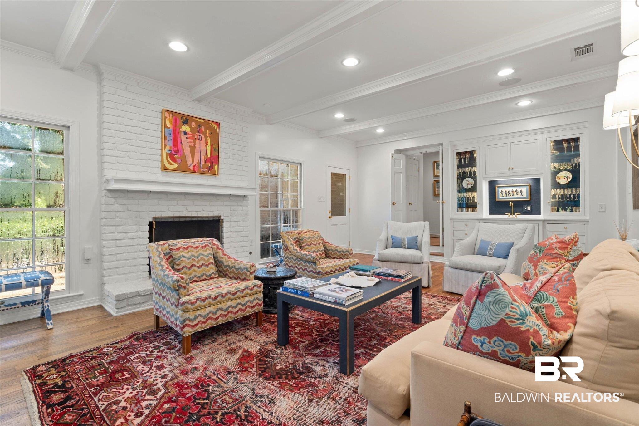 3612 Linden Lane Mobile, AL 36608 - Photo 7 of 42 Living area featuring wood finished floors, recessed lighting, crown molding, beam ceiling, and a brick fireplace