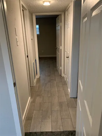 wooden floor with a rug