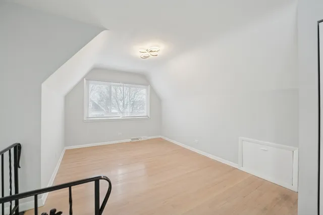 a view of empty room with windows