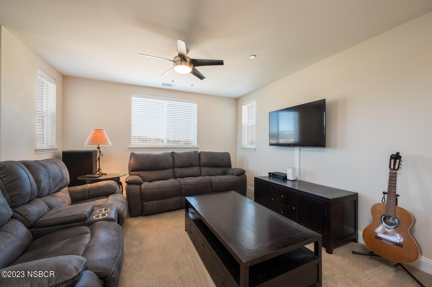 625 Agapanthus Way Santa Maria, CA 93455 - Photo 18 of 37 a living room with furniture and a flat screen tv
