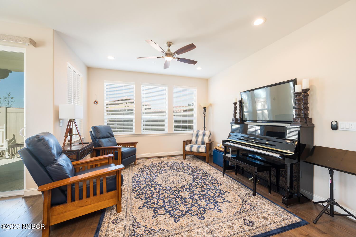 625 Agapanthus Way Santa Maria, CA 93455 - Photo 2 of 37 a living room with furniture and a flat screen tv with wooden floor