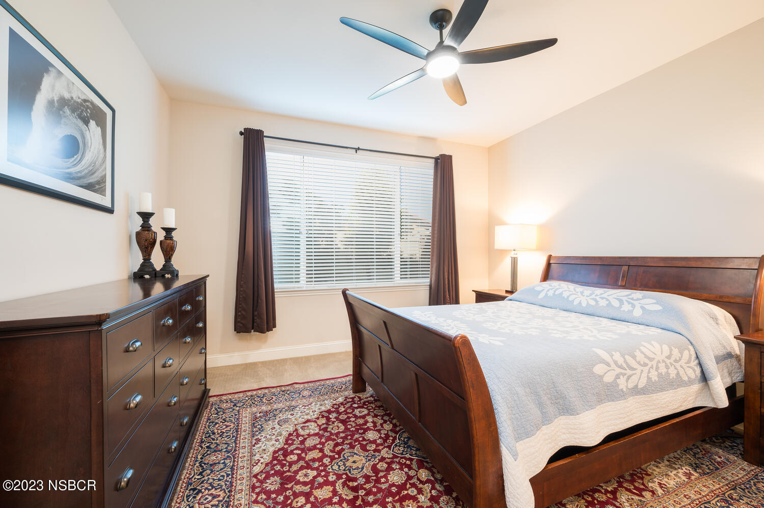 625 Agapanthus Way Santa Maria, CA 93455 - Photo 9 of 37 a bedroom with a bed and a chandelier