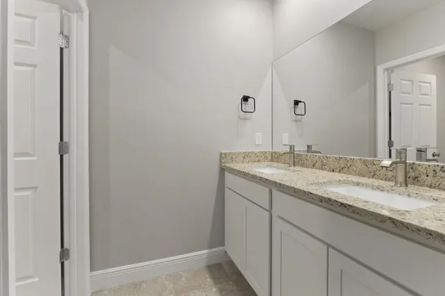 a bathroom with a toilet and a bathtub