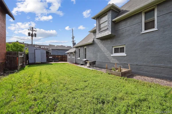 a house view with a garden space