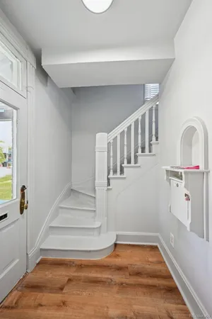 a view of a hallway with staircase