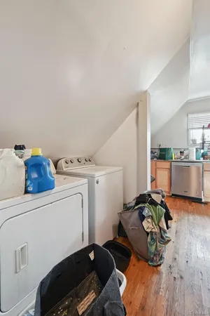 a bedroom with a bed and a chair