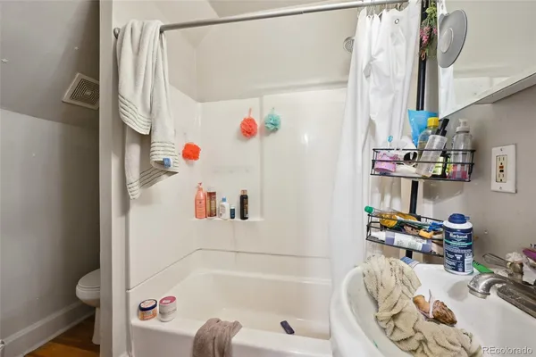 a view of outdoor space with shower and entertaining space