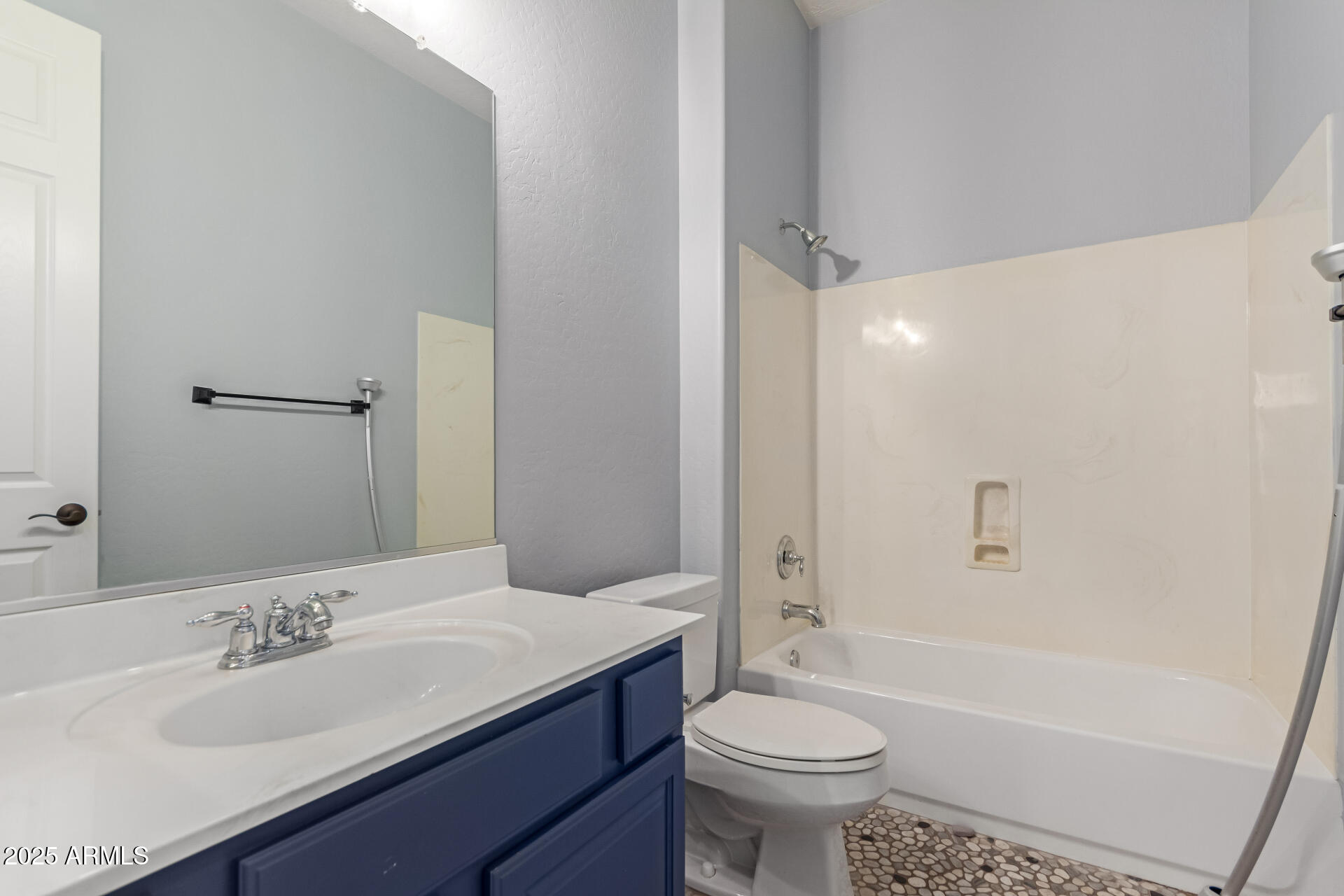 3054 South Colonial Street Gilbert, AZ 85295 - Photo 20 of 29 a bathroom with a granite countertop sink toilet and shower