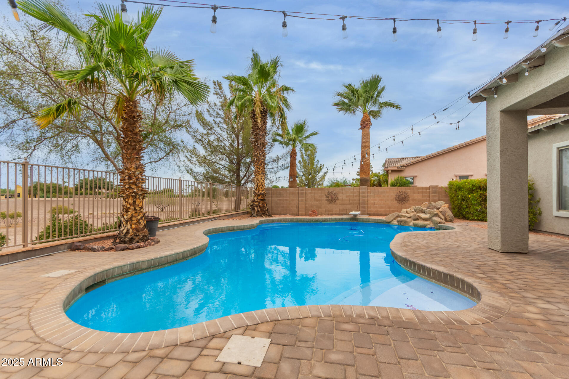 3054 South Colonial Street Gilbert, AZ 85295 - Photo 28 of 29 a view of swimming pool with outdoor seating and plants