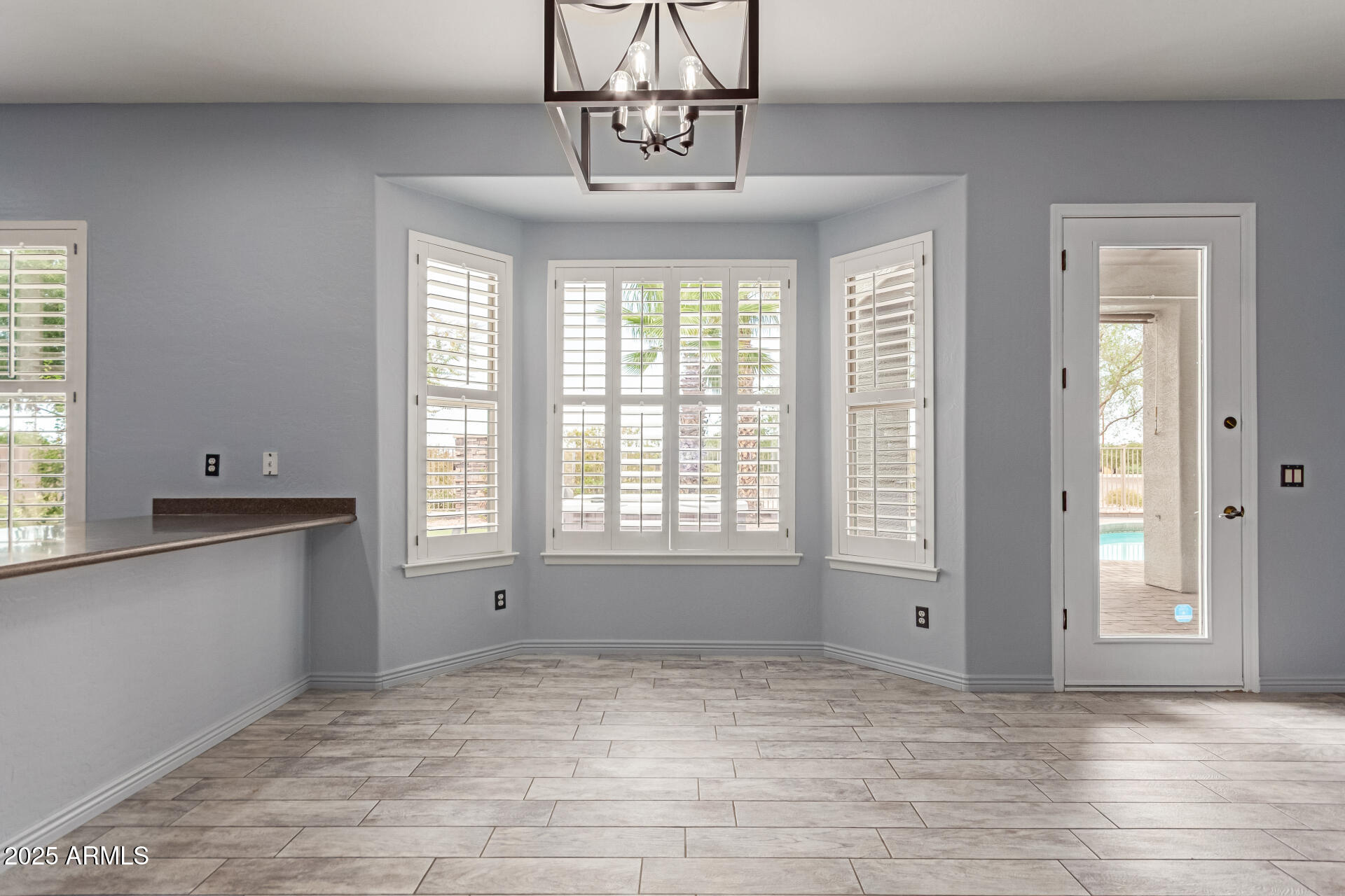 3054 South Colonial Street Gilbert, AZ 85295 - Photo 6 of 29 a view of an empty room with a window