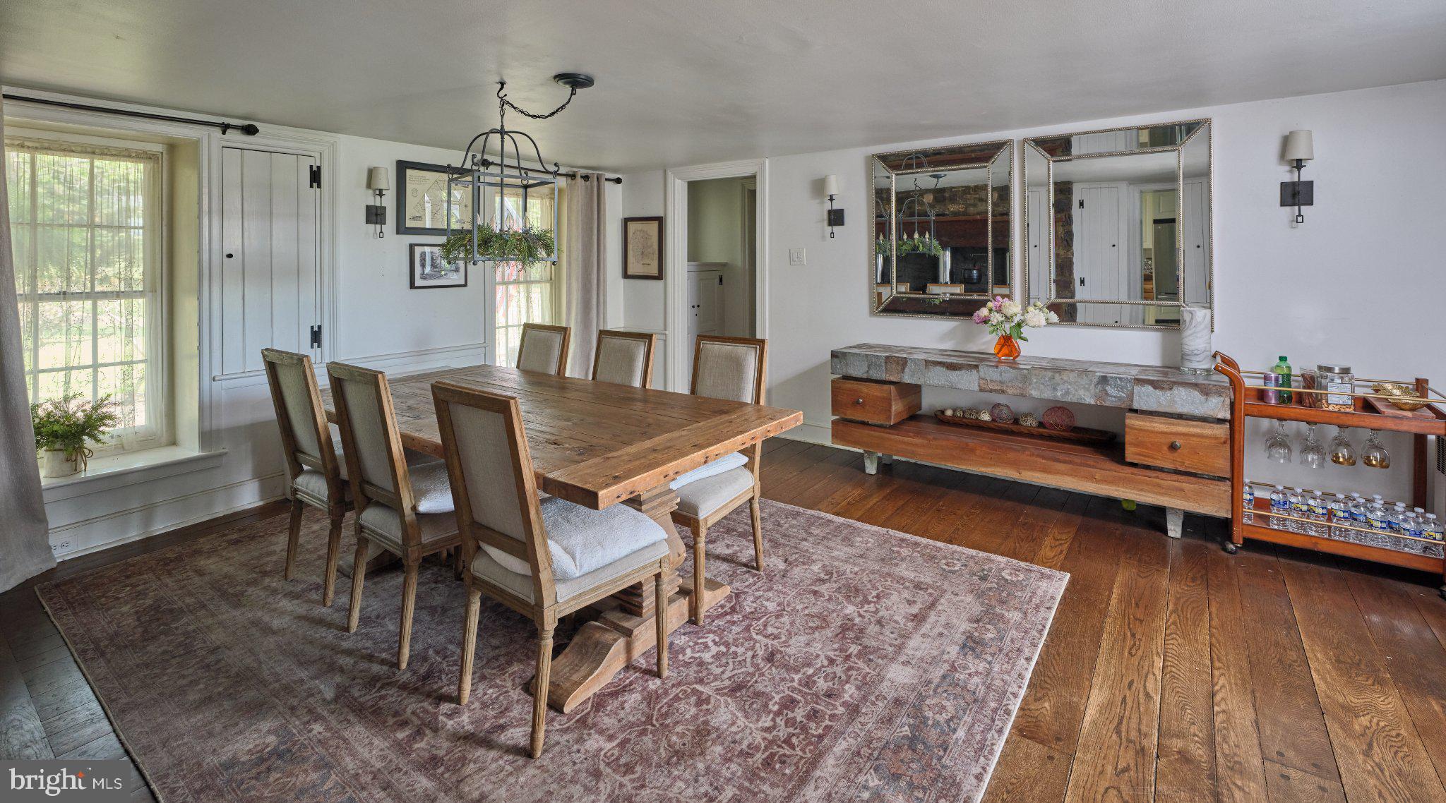 765 Swamp Road Newtown, PA 18940 - Photo 9 of 37 a dining room with furniture and wooden floor