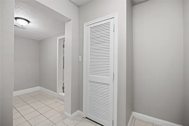 a view of a kitchen space with wooden floor