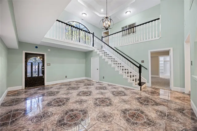 a view of a livingroom with a staircase