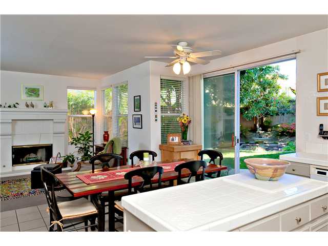 4890 Riding Ridge Road San Diego, CA 92130 - Photo 12 of 25 Standing in kitchen looking into family room.