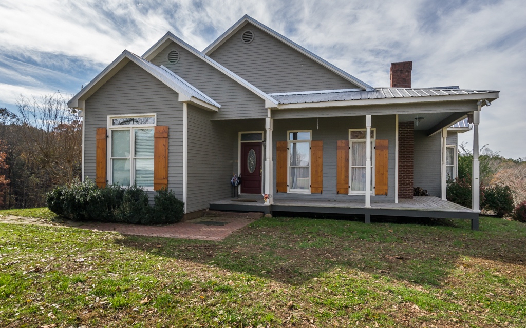 2004 Clear Creek Road Ellijay, GA 30536 - Photo 1 of 1 a view of a house with backyard and garden