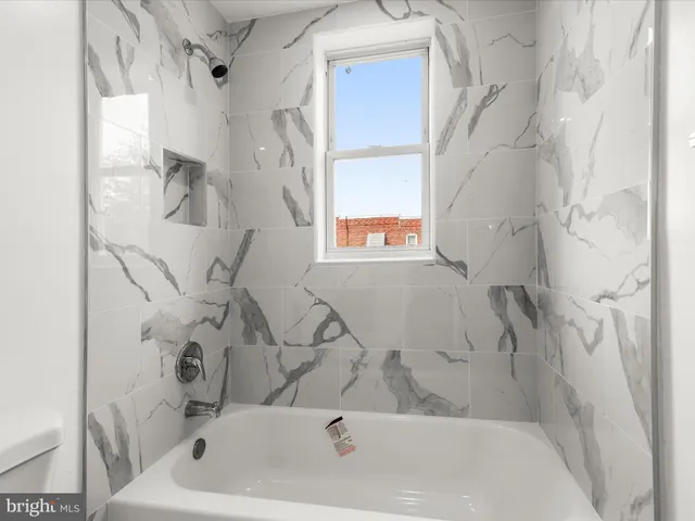 a bathroom with a bathtub