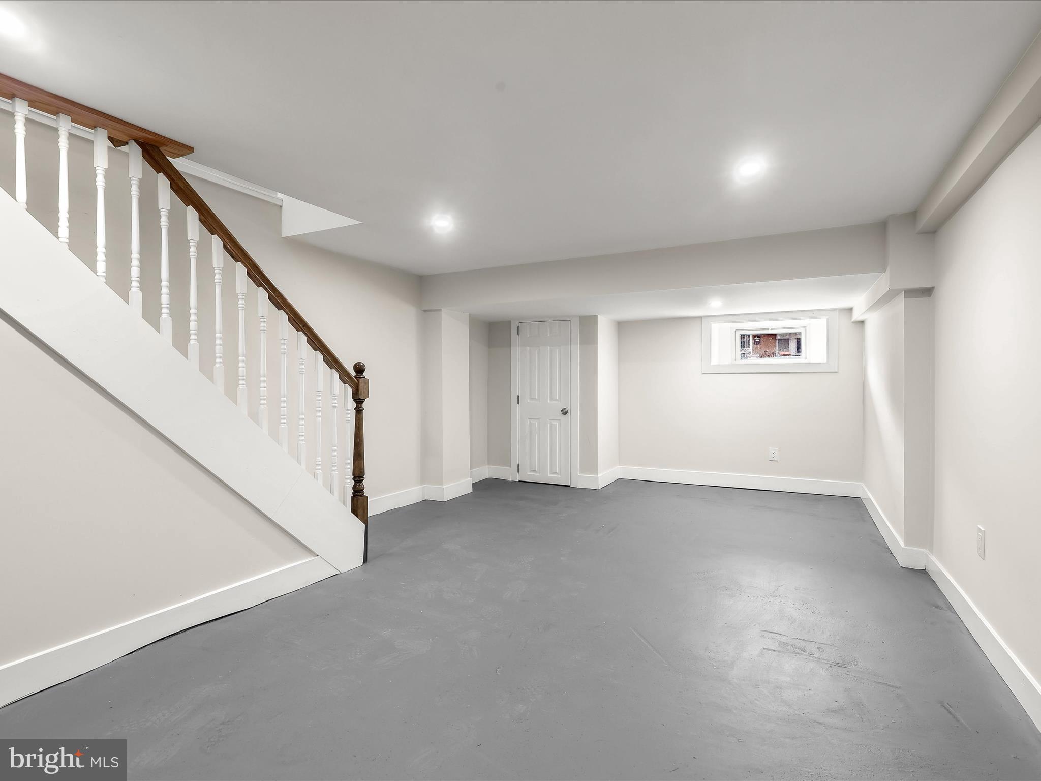 2800 East Chase Street Baltimore, MD 21213 - Photo 26 of 37 a view of an empty room with wooden floor