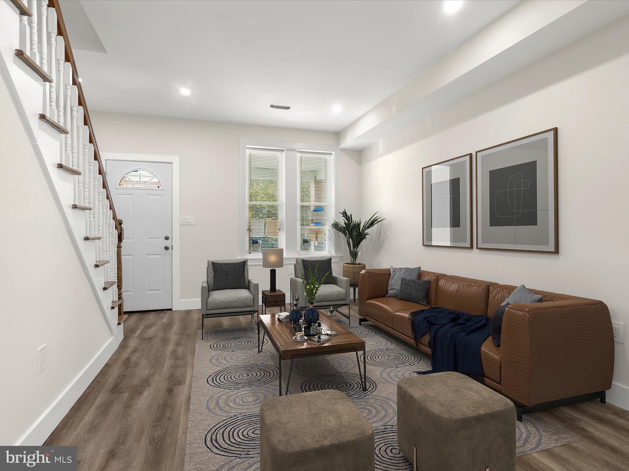 2800 East Chase Street Baltimore, MD 21213 - Photo 3 of 37 a living room with furniture and a painting