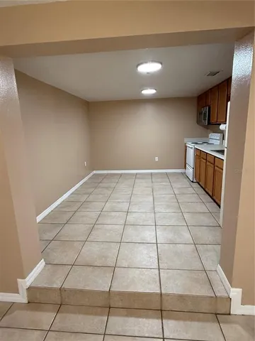 a view of a kitchen with a sink