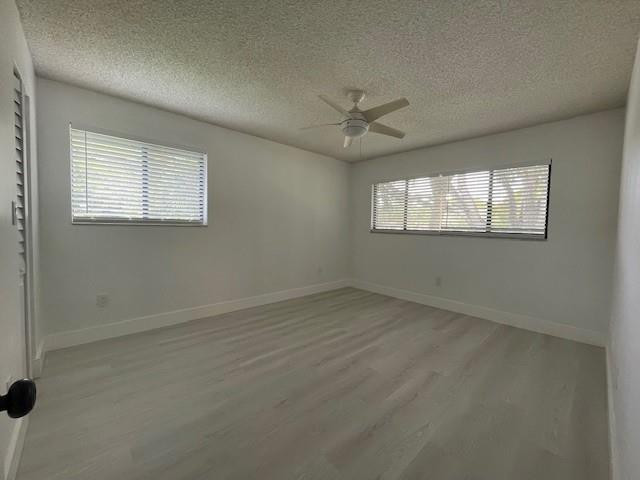9499 West McNab Road, Unit 208 Tamarac, FL 33321 - Photo 15 of 19 an empty room with a window