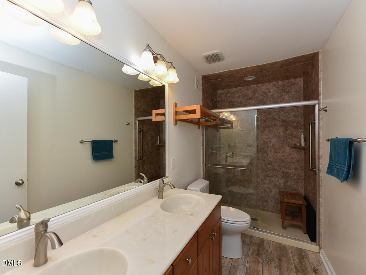 178 Paceville Road Selma, NC 27576 - Photo 18 of 30 a bathroom with a sink toilet and shower