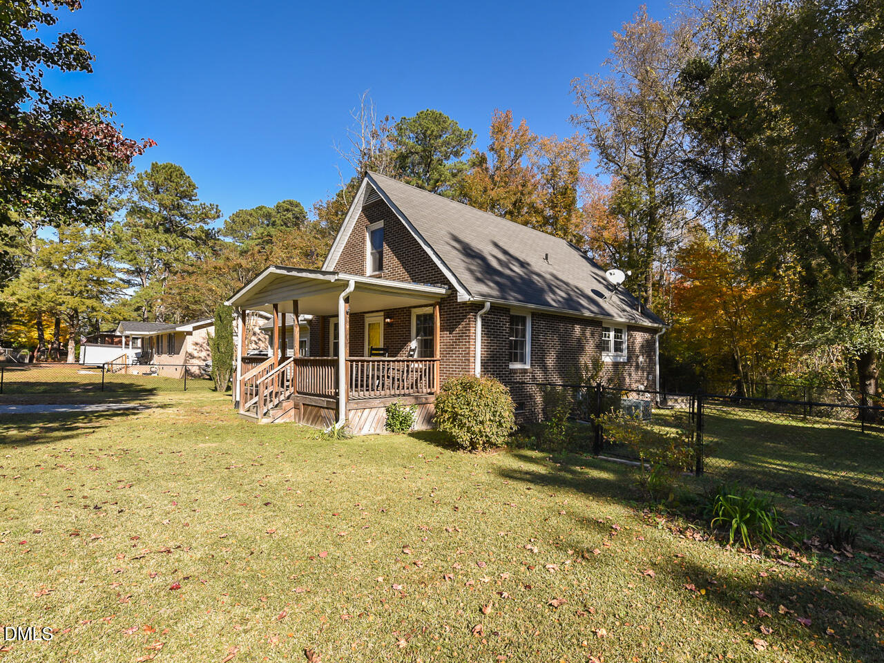 178 Paceville Road Selma, NC 27576 - Photo 2 of 30 a front view of a house with a yard table and chairs