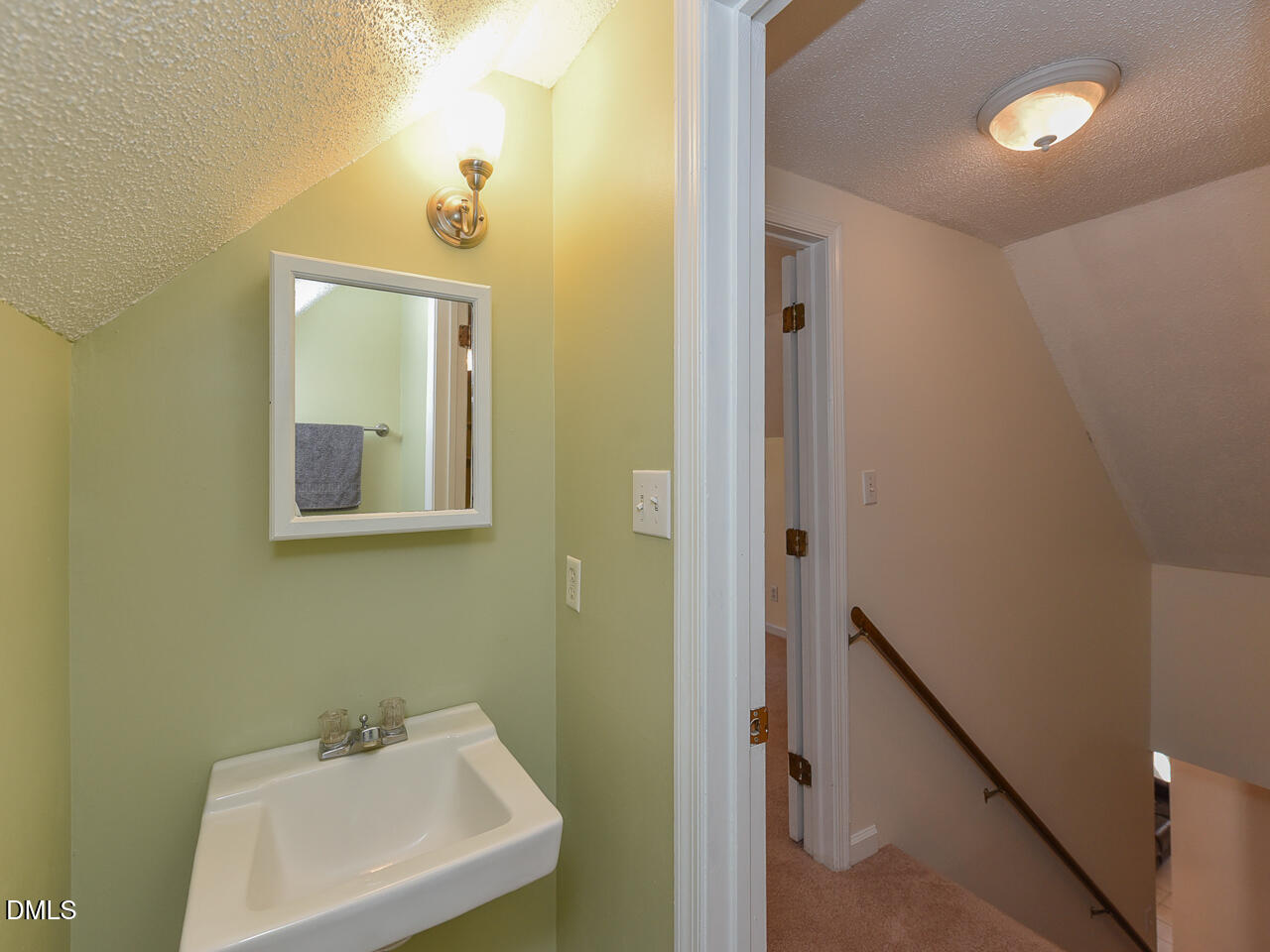 178 Paceville Road Selma, NC 27576 - Photo 25 of 30 a bathroom with a sink and mirror with toilet
