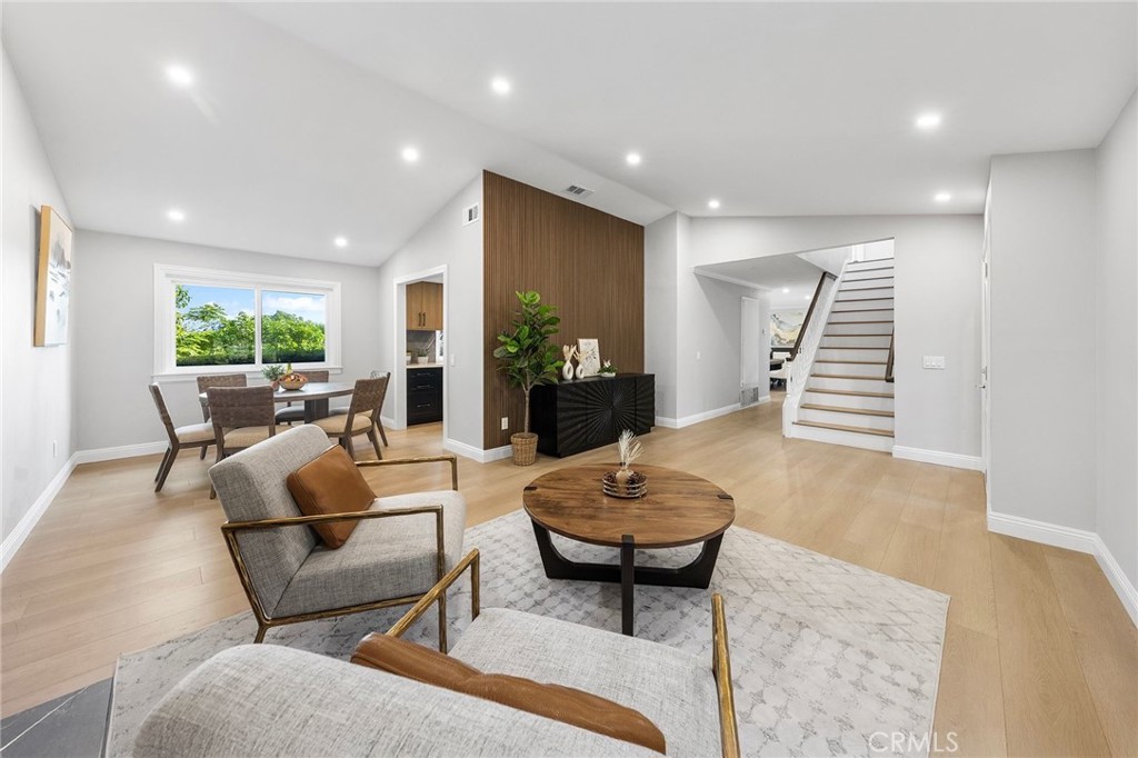 8093 Banyan Street Rancho Cucamonga, CA 91701 - Photo 13 of 65 a living room with furniture and a large window