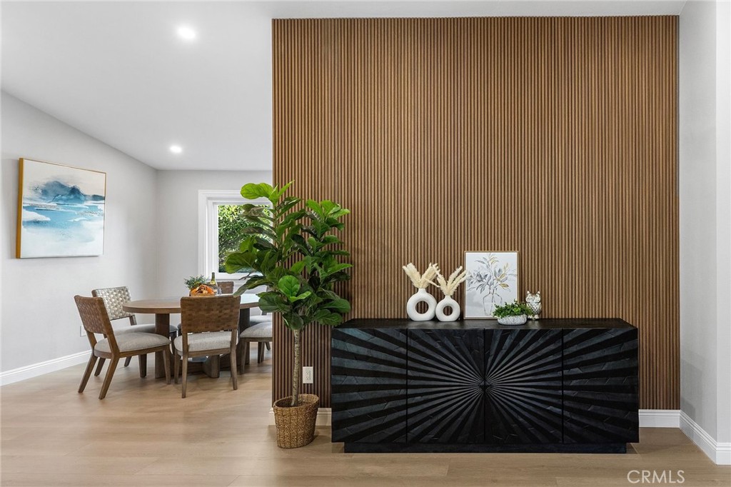 8093 Banyan Street Rancho Cucamonga, CA 91701 - Photo 16 of 65 a dining room with furniture and a potted plant