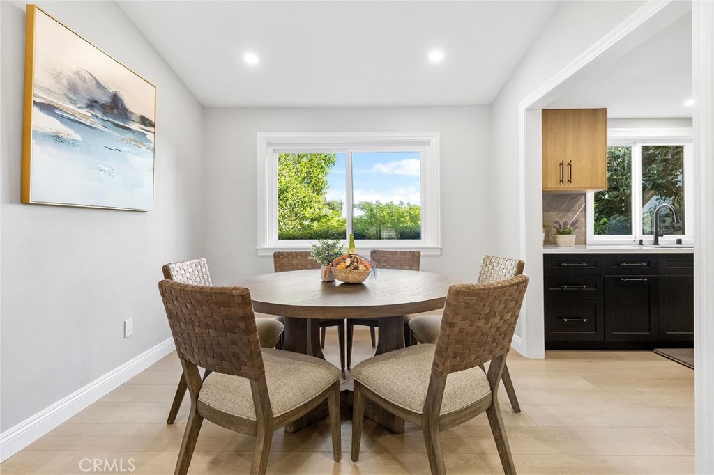 8093 Banyan Street Rancho Cucamonga, CA 91701 - Photo 23 of 65 a view of a dining room with furniture and window