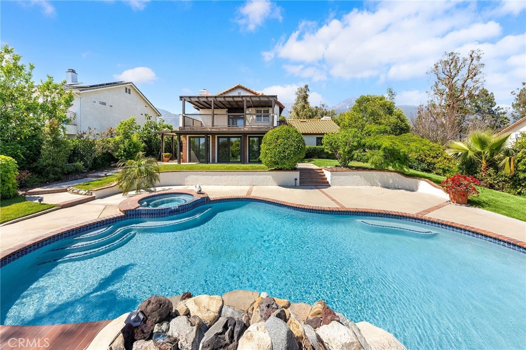 8093 Banyan Street Rancho Cucamonga, CA 91701 - Photo 44 of 65 a view of a house with a yard