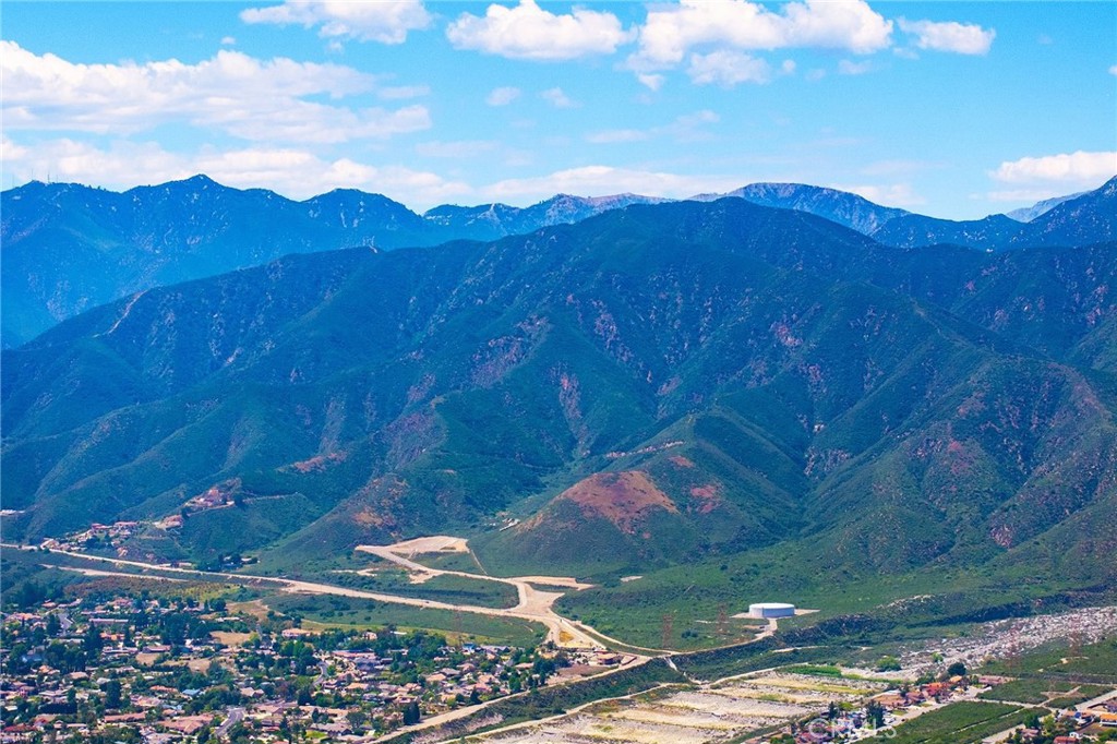 8093 Banyan Street Rancho Cucamonga, CA 91701 - Photo 63 of 65 a view of a lush green hillside and houses