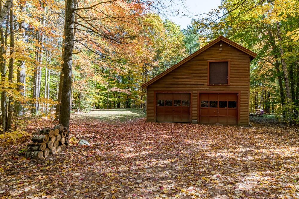 558 Castle Island Road Mount Vernon, ME 04352 - Photo 75 of 97 Garage with lots of storage above