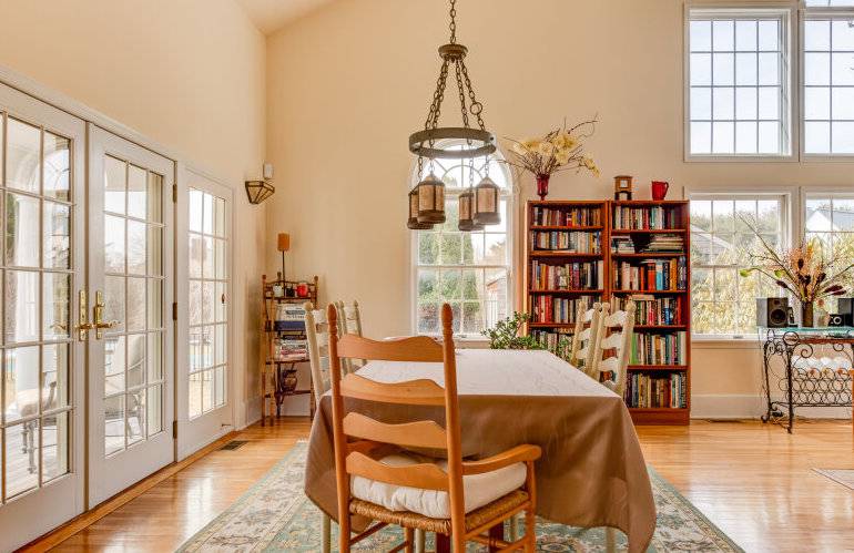 491 Butter Lane Bridgehampton, NY 11932 - Photo 11 of 39 a dining room with furniture window and wooden floor