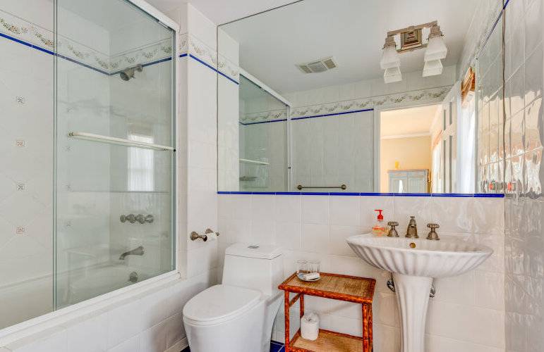 491 Butter Lane Bridgehampton, NY 11932 - Photo 17 of 39 a bathroom with a sink toilet and shower